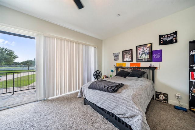 11434 Ketch Ct, Willis, TX 77318 - bedroom with carpet floors, access to outside, and baseboards