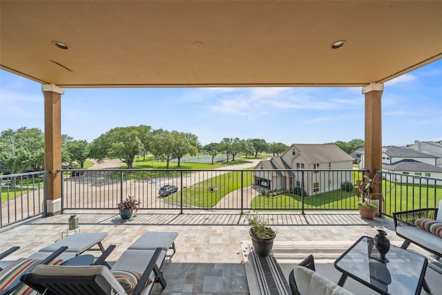 11434 Ketch Ct, Willis, TX 77318 - view of patio featuring a balcony and a residential view