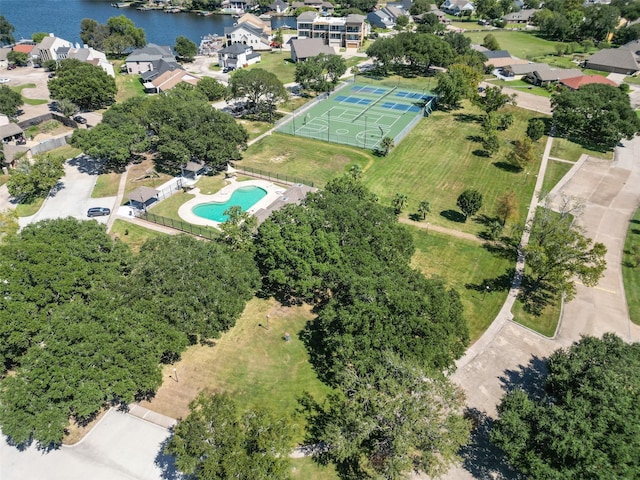 11434 Ketch Ct, Willis, TX 77318 - aerial view of property's location with a large body of water and a pool