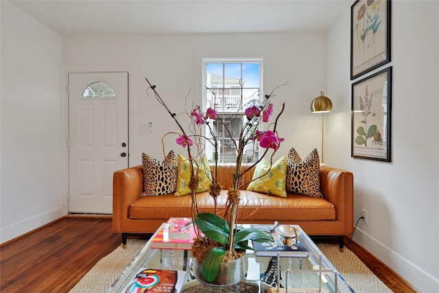 1305 Postoffice, Galveston, TX 77550 - living area featuring wood finished floors and baseboards