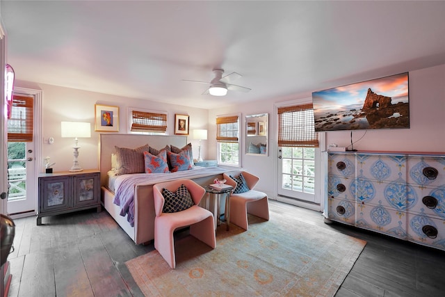 1305 Postoffice, Galveston, TX 77550 - bedroom featuring wood-type flooring, access to exterior, and a ceiling fan