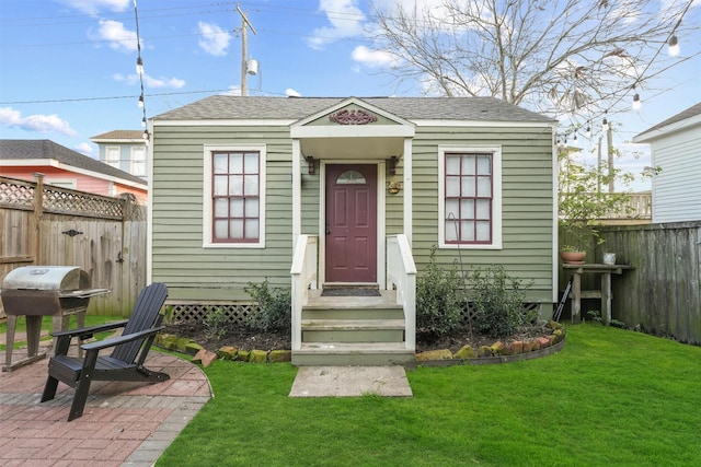1305 Postoffice, Galveston, TX 77550 - view of front facade with a shingled roof