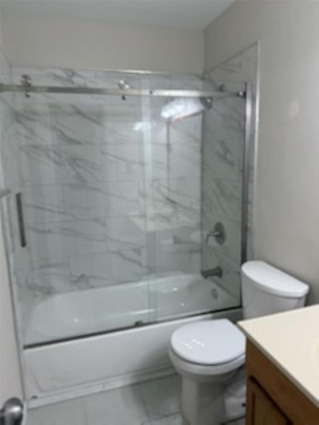 8615 Washington Blvd, Beaumont, TX 77707 - bathroom featuring vanity, toilet, and enclosed tub / shower combo