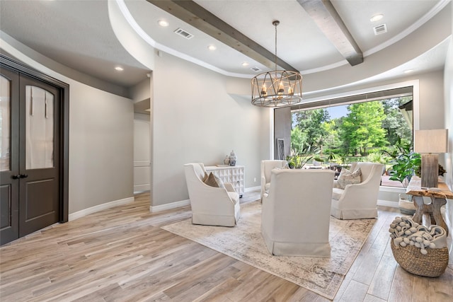 11 Turtle Cove Ct, Kingwood, TX 77346 - living area with light wood-style flooring, beamed ceiling, a chandelier, baseboards, and crown molding
