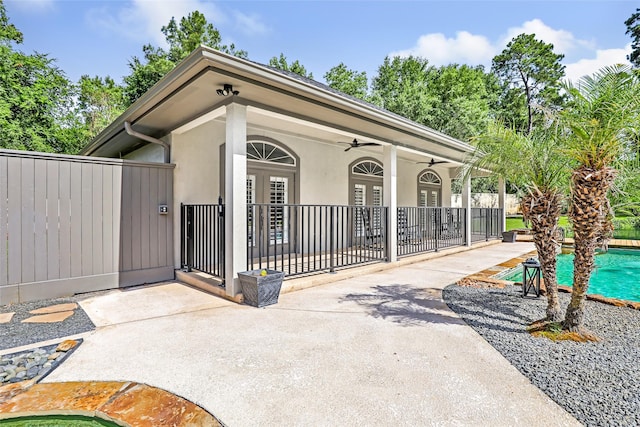 11 Turtle Cove Ct, Kingwood, TX 77346 - view of community with a swimming pool and a patio