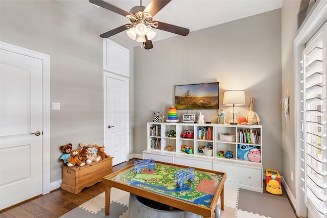 11 Turtle Cove Ct, Kingwood, TX 77346 - playroom with wood finished floors, ceiling fan, and baseboards