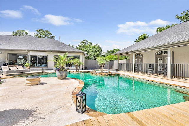 11 Turtle Cove Ct, Kingwood, TX 77346 - view of pool featuring a patio and an outdoor living space