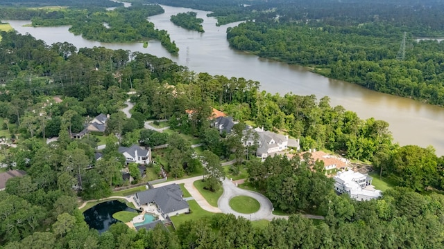 11 Turtle Cove Ct, Kingwood, TX 77346 - view of property location featuring a large body of water and a heavily wooded area