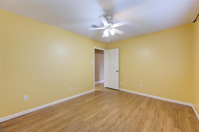 538 Everington Dr, Katy, TX 77450 - spare room with baseboards, light wood finished floors, and a ceiling fan