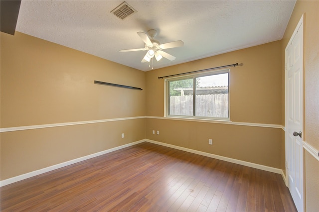 538 Everington Dr, Katy, TX 77450 - unfurnished room featuring wood finished floors, a ceiling fan, baseboards, and a textured ceiling