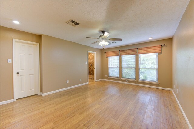 538 Everington Dr, Katy, TX 77450 - spare room featuring ceiling fan, baseboards, a textured ceiling, light wood-style flooring, and recessed lighting