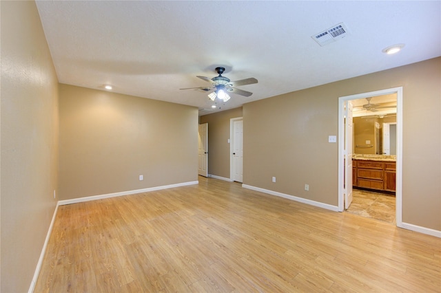 538 Everington Dr, Katy, TX 77450 - empty room with a ceiling fan, light wood-style floors, baseboards, and recessed lighting