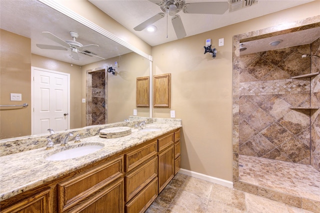 538 Everington Dr, Katy, TX 77450 - bathroom with a ceiling fan, walk in shower, baseboards, and double vanity