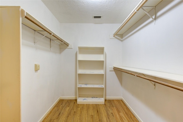 538 Everington Dr, Katy, TX 77450 - walk in closet with light wood finished floors