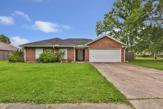 22 Park Place St, Dayton, TX 77535 - single story home with driveway, a garage, and brick siding