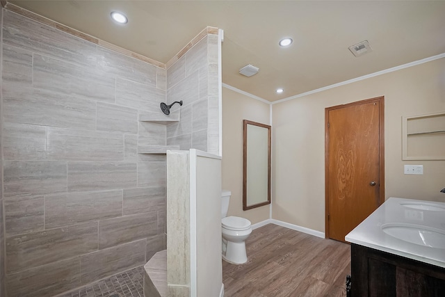 12346 Gainsborough Dr, Houston, TX 77031 - bathroom featuring crown molding, walk in shower, wood finished floors, toilet, and recessed lighting