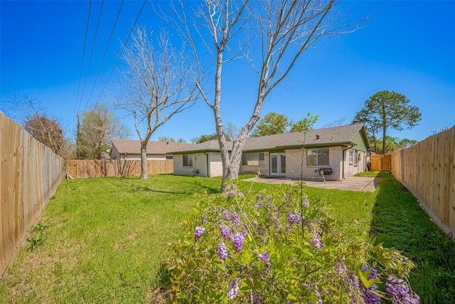 12346 Gainsborough Dr, Houston, TX 77031 - view of yard with a patio area