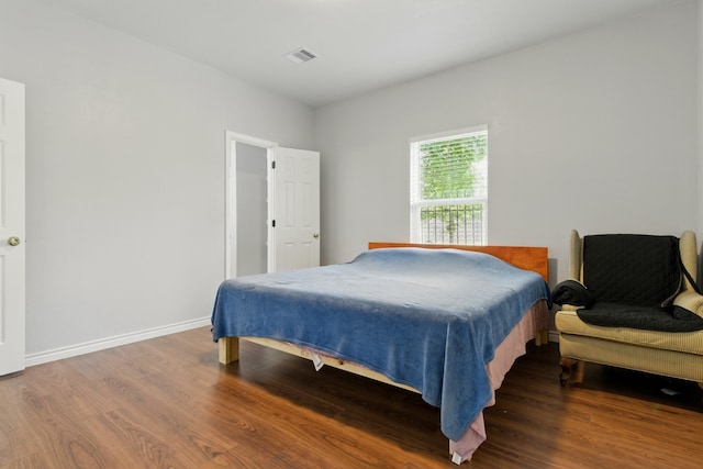 953 Rd 5606, Cleveland, TX 77327 - bedroom with wood finished floors and baseboards