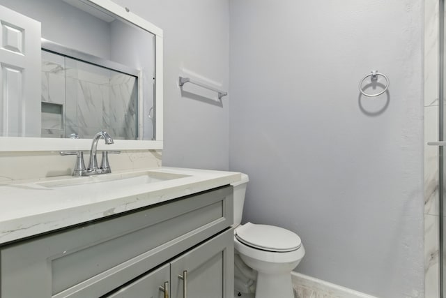 953 Rd 5606, Cleveland, TX 77327 - full bath with vanity, toilet, a marble finish shower, and baseboards