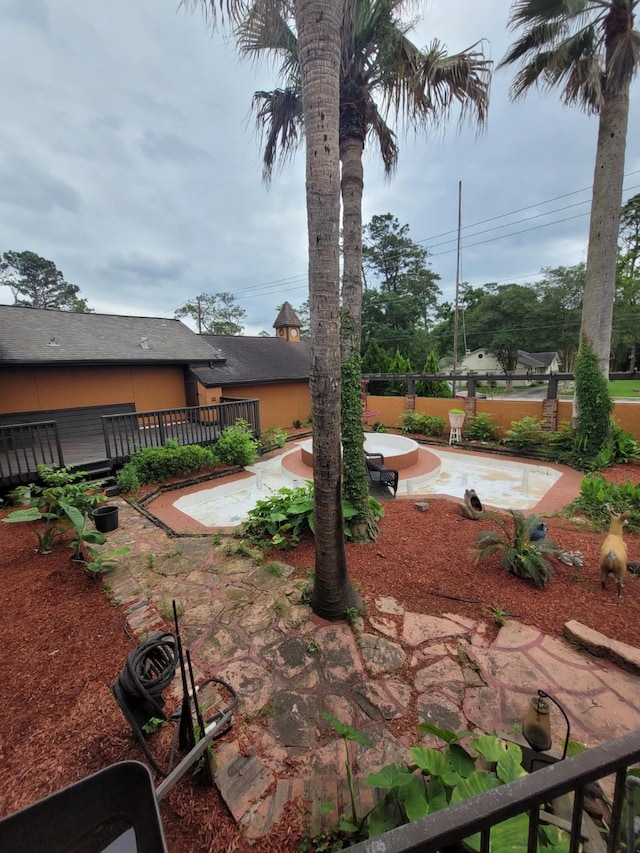 2013 Deats Rd, Dickinson, TX 77539 - view of yard featuring a wooden deck and a patio area