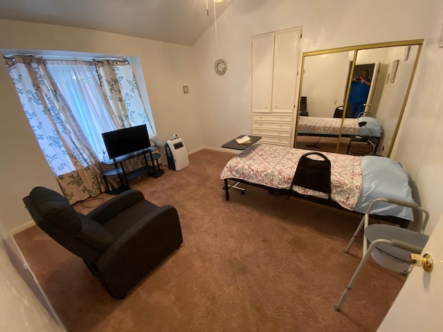 2013 Deats Rd, Dickinson, TX 77539 - carpeted bedroom featuring lofted ceiling, a closet, baseboards, and ceiling fan