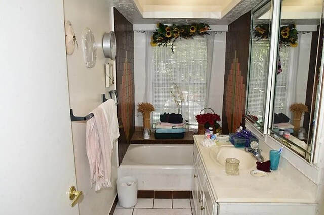 2013 Deats Rd, Dickinson, TX 77539 - bathroom with vanity, tile patterned floors, and a tub to relax in