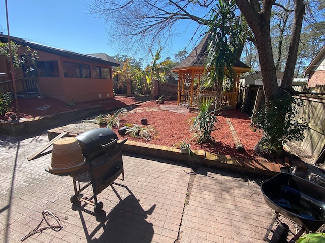 2013 Deats Rd, Dickinson, TX 77539 - fenced backyard featuring a patio and a gazebo