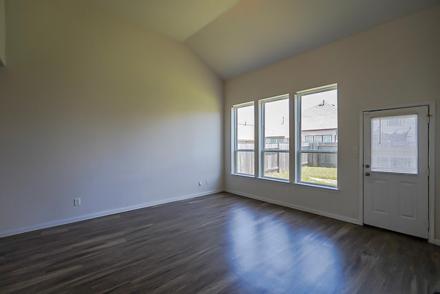 10314 White Fir Villa Ave, Houston, TX 77044 - unfurnished room with dark wood finished floors, baseboards, and lofted ceiling