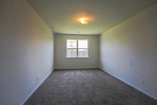 10314 White Fir Villa Ave, Houston, TX 77044 - carpeted spare room featuring baseboards