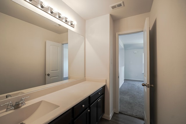 10314 White Fir Villa Ave, Houston, TX 77044 - bathroom with vanity and baseboards