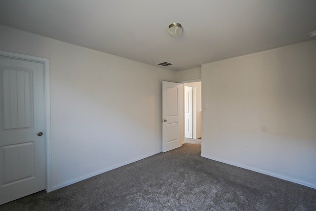 10314 White Fir Villa Ave, Houston, TX 77044 - unfurnished room featuring dark carpet and baseboards