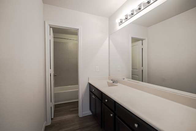 10314 White Fir Villa Ave, Houston, TX 77044 - bathroom featuring wood finished floors, vanity, and baseboards