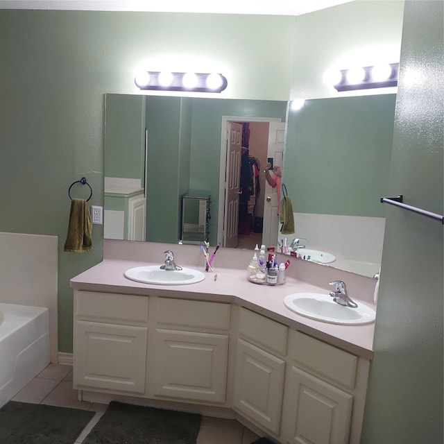 13564 Miller Ln, Willis, TX 77318 - full bathroom with a bath, tile patterned floors, and double vanity