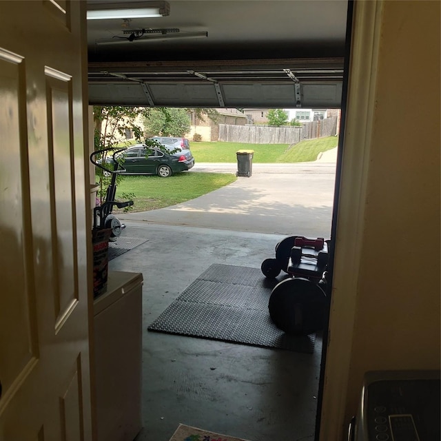 13564 Miller Ln, Willis, TX 77318 - doorway to outside with concrete flooring