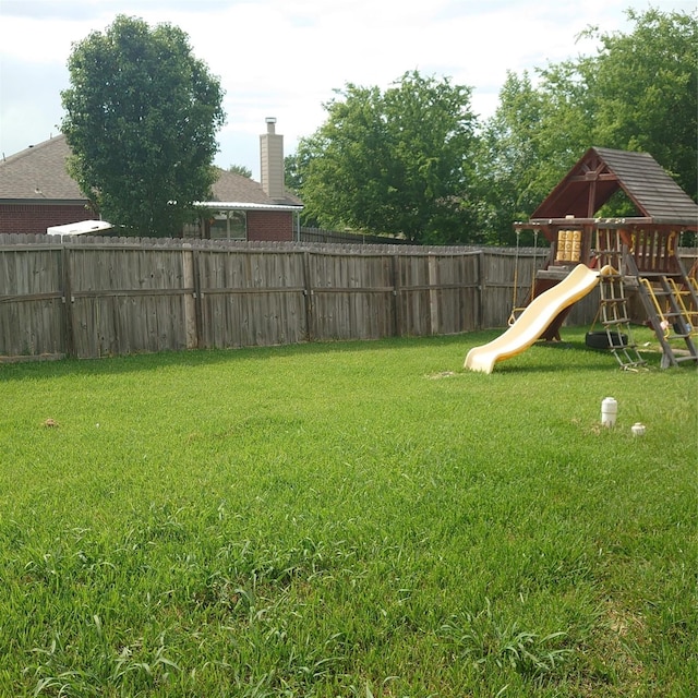 13564 Miller Ln, Willis, TX 77318 - view of yard with a playground