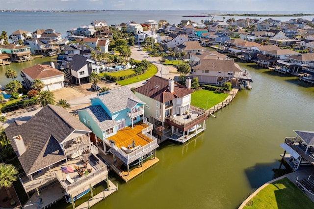 1022 Long Reach Dr, Tiki Island, TX 77554 - aerial view of residential area with a nearby body of water
