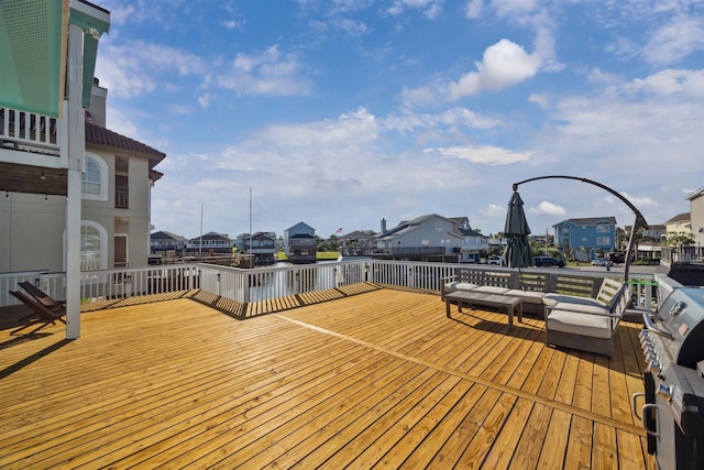 1022 Long Reach Dr, Tiki Island, TX 77554 - wooden deck with a residential view and a water view