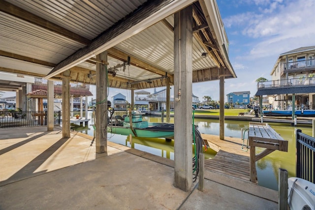 1022 Long Reach Dr, Tiki Island, TX 77554 - dock area featuring boat lift and a water view