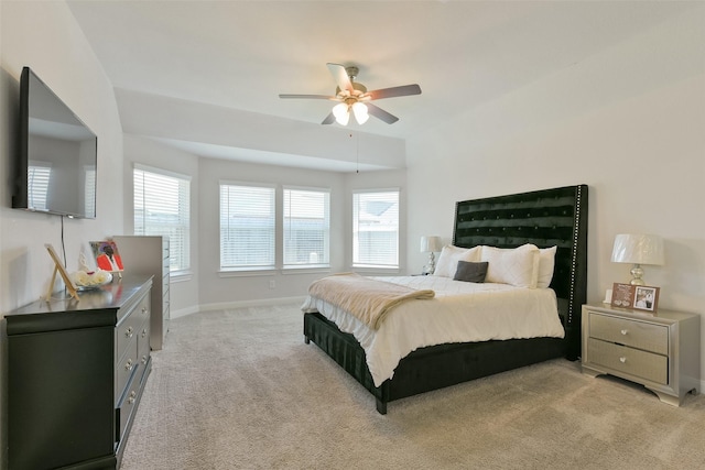 8902 Jasper Lake Dr, Cypress, TX 77433 - bedroom with light colored carpet, multiple windows, baseboards, and ceiling fan
