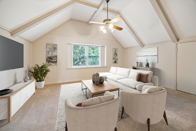 living room with light carpet, ceiling fan, and a decorative wall