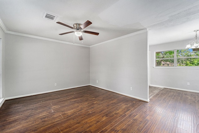 7433 Yoe St, Houston, TX 77016 - spare room with a chandelier, ceiling fan, dark wood-style flooring, baseboards, and crown molding