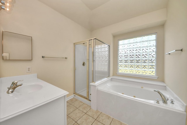 17127 Sheffield Pines Ln, Houston, TX 77095 - bathroom featuring tile patterned floors, a stall shower, a jetted tub, and vanity