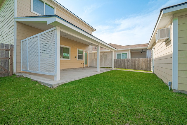 1526 Claremont Garden Cir, Houston, TX 77047 - view of yard featuring a patio area and a wall unit AC