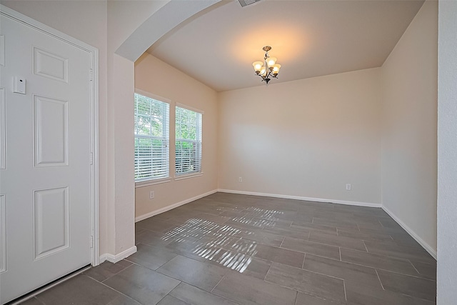 1526 Claremont Garden Cir, Houston, TX 77047 - empty room with arched walkways, a chandelier, and baseboards