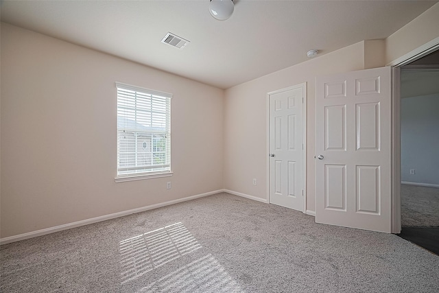 1526 Claremont Garden Cir, Houston, TX 77047 - unfurnished bedroom with carpet flooring and baseboards