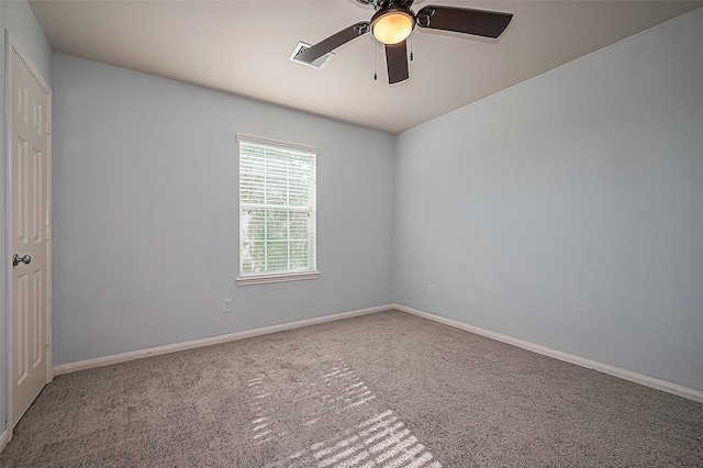1526 Claremont Garden Cir, Houston, TX 77047 - empty room with carpet flooring, ceiling fan, and baseboards