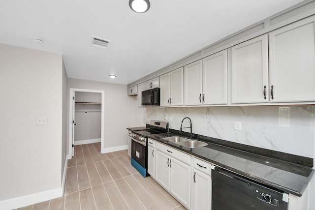 5903 Belneath St, Houston, TX 77033 - kitchen featuring black appliances, a sink, tasteful backsplash, baseboards, and dark stone counters
