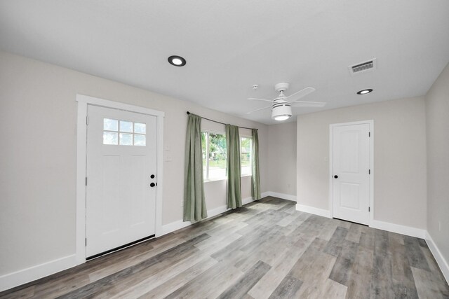 5903 Belneath St, Houston, TX 77033 - foyer entrance featuring a ceiling fan, wood finished floors, baseboards, and recessed lighting
