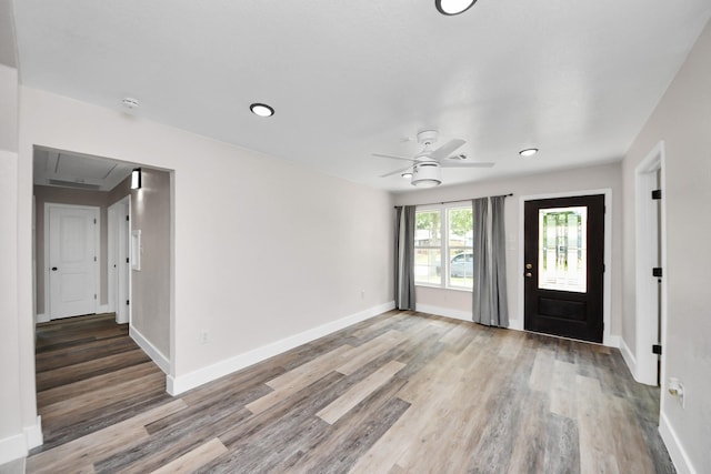 5903 Belneath St, Houston, TX 77033 - entryway with wood finished floors, ceiling fan, baseboards, and recessed lighting