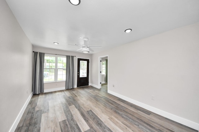 5903 Belneath St, Houston, TX 77033 - entryway featuring baseboards, wood finished floors, ceiling fan, and recessed lighting